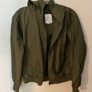 green windbreaker jacket